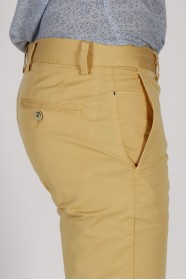 YELLOW COLORED, REGULAR-FIT CHINO TROUSERS.